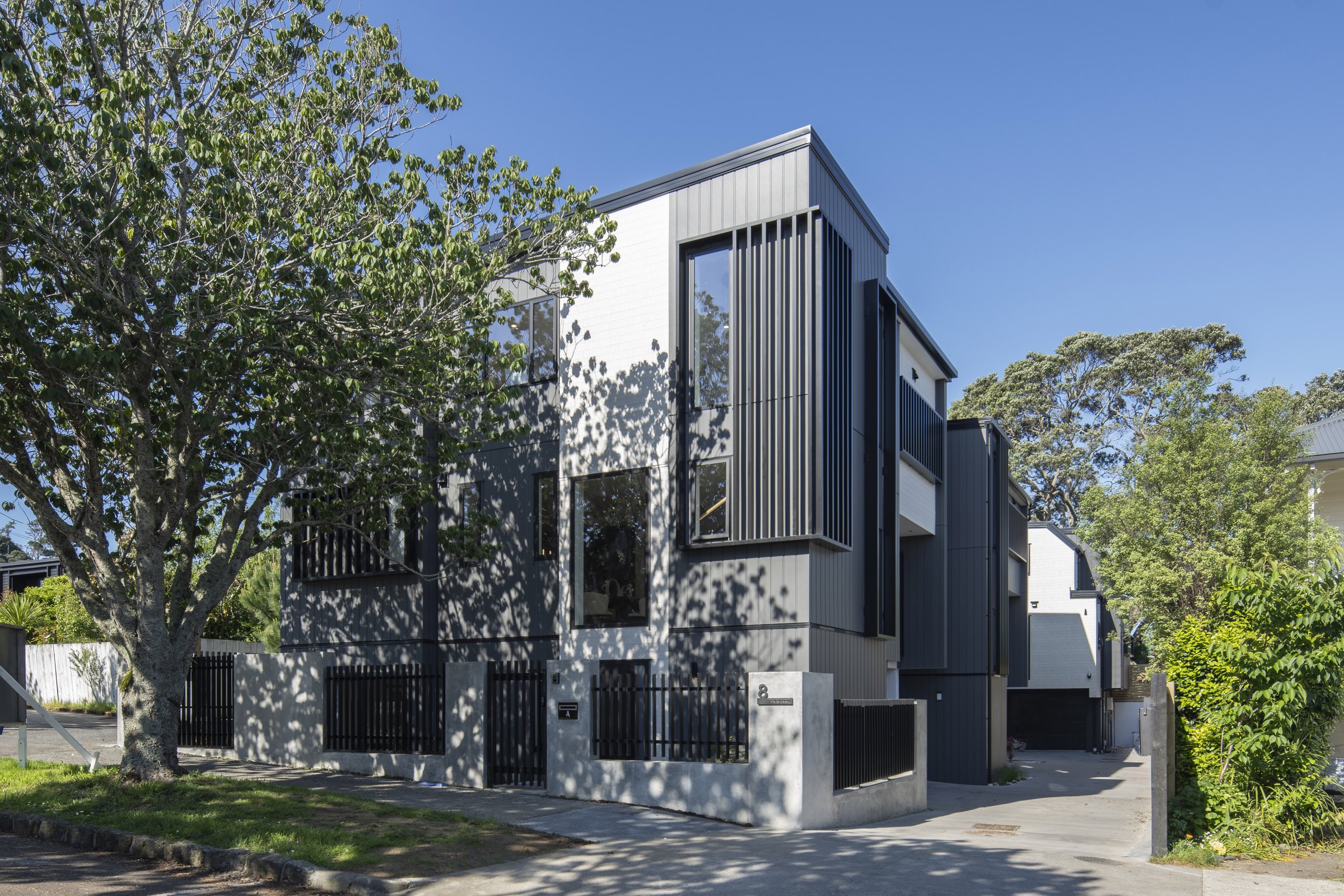 Completed Mt Eden townhouse exterior viewed from Eglinton Avenue.